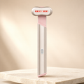 Red and blue light eye massager, product shot on stone