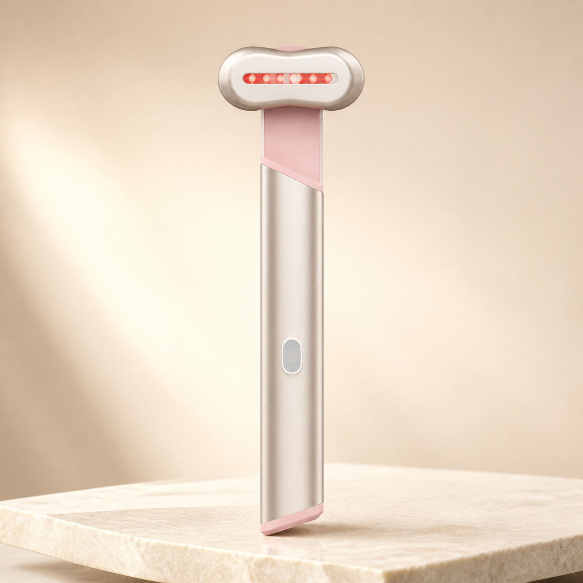 Red and blue light eye massager, product shot on stone