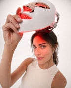 GLOWMASK Red Light Therapy Mask worn during an at-home session